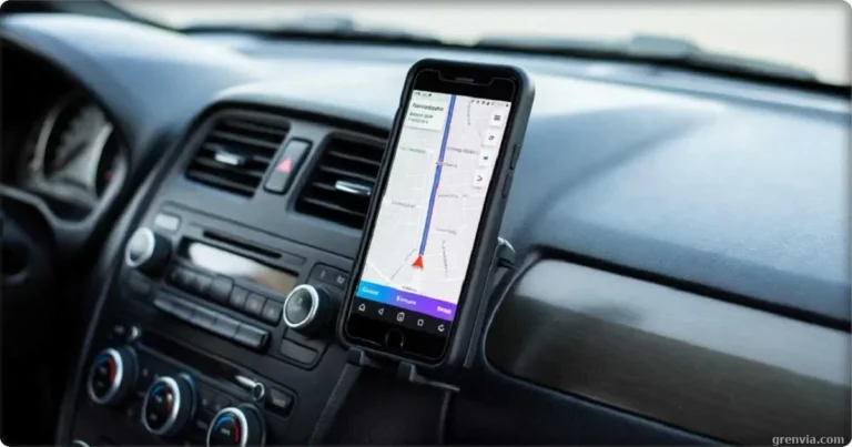 Essential apps for navigation fuel and roadside assistance on a smartphone mounted in a car dashboard